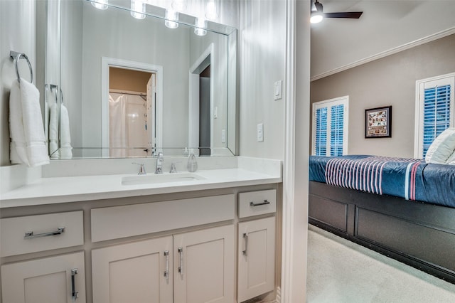 5932 Royal Palm Dr, Plano, TX 75093 - ensuite bathroom featuring vanity, ornamental molding, and ceiling fan