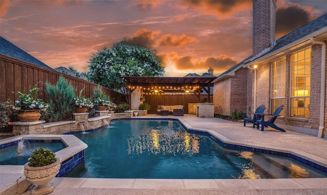 5932 Royal Palm Dr, Plano, TX 75093 - view of swimming pool featuring a fenced backyard, a patio, a pool with connected hot tub, and an outdoor hangout area