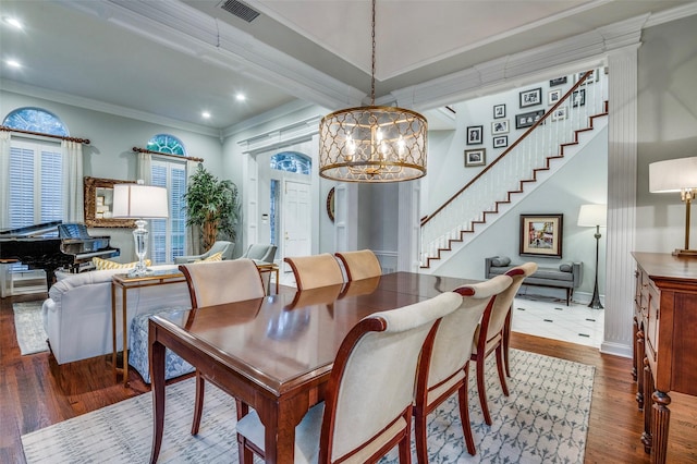 5932 Royal Palm Dr, Plano, TX 75093 - dining area with hardwood / wood-style floors, stairway, crown molding, recessed lighting, and a chandelier