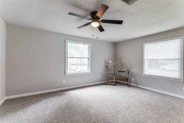 4332 Blackstone Dr, Fort Worth, TX 76114 - spare room featuring carpet, ceiling fan, baseboards, and a textured ceiling