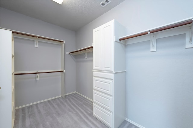 9405 Meyers Cyn, Plano, TX 75025 - walk in closet with light colored carpet