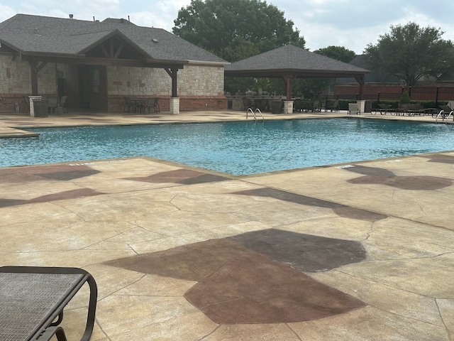 9405 Meyers Cyn, Plano, TX 75025 - community pool with a gazebo and a patio area