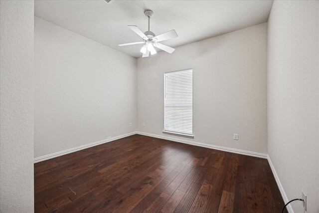 11181 Clearstream Ln, Frisco, TX 75035 - unfurnished room with dark wood finished floors, ceiling fan, and baseboards
