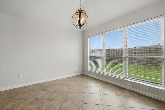 237 Cedar Crest Dr, Justin, TX 76247 - unfurnished room featuring a chandelier, baseboards, and light tile patterned floors