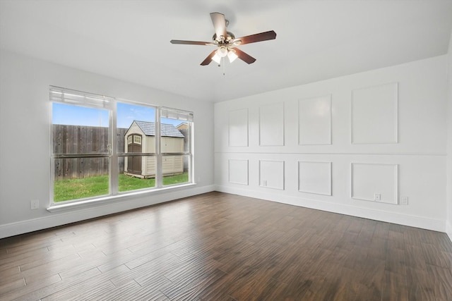 237 Cedar Crest Dr, Justin, TX 76247 - unfurnished room featuring baseboards, ceiling fan, and dark wood-style floors