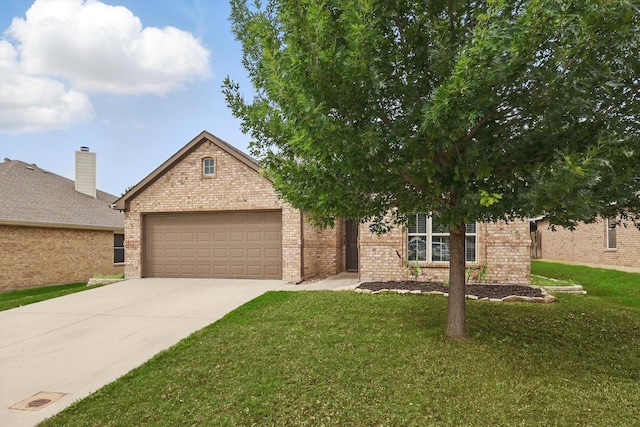 237 Cedar Crest Dr, Justin, TX 76247 - view of front of home with brick siding, concrete driveway, a garage, and a front lawn