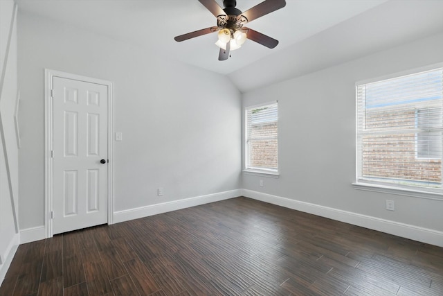 237 Cedar Crest Dr, Justin, TX 76247 - spare room with dark wood-type flooring, baseboards, a ceiling fan, and vaulted ceiling