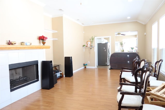 2003 Hearthside Ln, Garland, TX 75044 - living area featuring ornamental molding, light wood-style floors, a fireplace, recessed lighting, and baseboards
