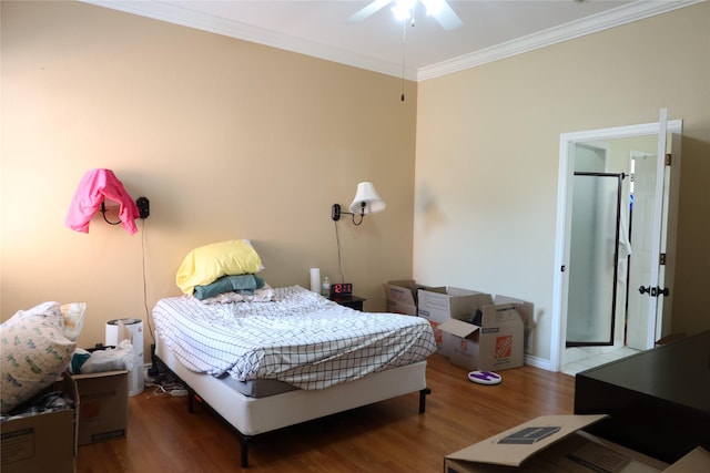 2003 Hearthside Ln, Garland, TX 75044 - bedroom featuring wood finished floors, crown molding, and baseboards