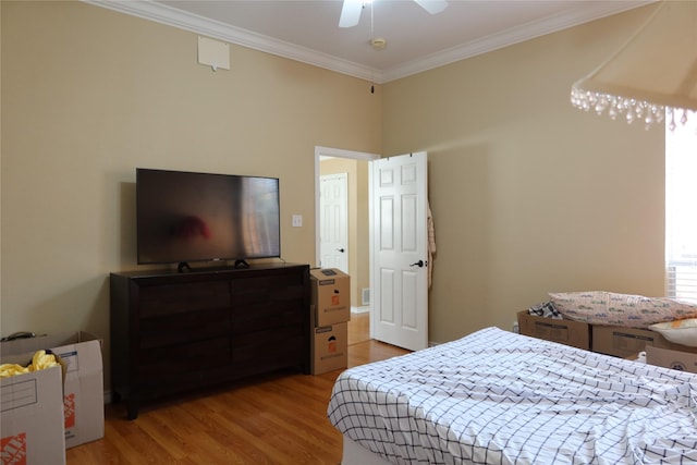 2003 Hearthside Ln, Garland, TX 75044 - bedroom with light wood-style flooring and crown molding