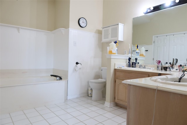 2003 Hearthside Ln, Garland, TX 75044 - bathroom with a bath, vanity, toilet, and tile patterned floors