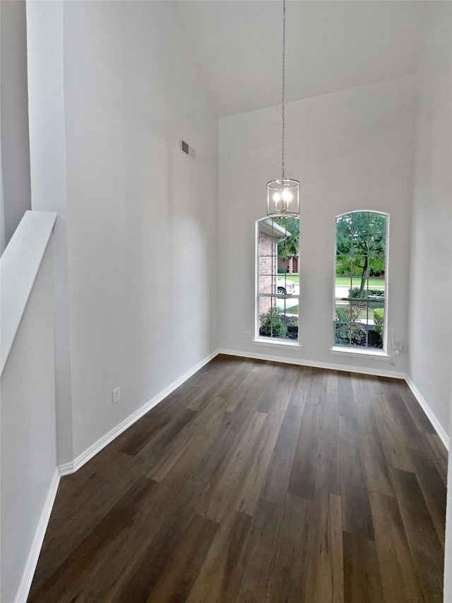 3032 Thicket Bend Ct, Fort Worth, TX 76244 - unfurnished dining area with high vaulted ceiling, a chandelier, dark wood finished floors, and baseboards