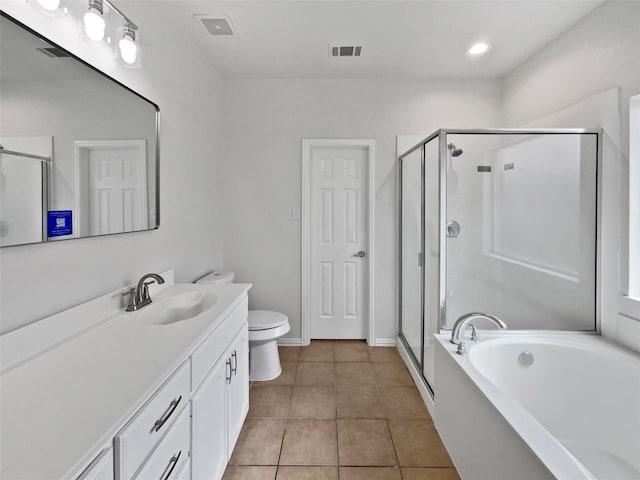 3032 Thicket Bend Ct, Fort Worth, TX 76244 - full bathroom featuring vanity, a stall shower, toilet, a bath, and tile patterned flooring