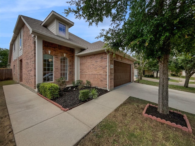 3032 Thicket Bend Ct, Fort Worth, TX 76244 - view of front of home featuring brick siding, an attached garage, concrete driveway, and a shingled roof