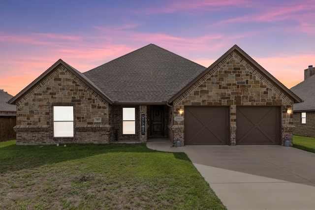 183 Melbourne Dr, Willow Park, TX 76087 - french country inspired facade featuring an attached garage, concrete driveway, a yard, and stone siding