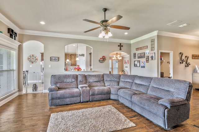 183 Melbourne Dr, Willow Park, TX 76087 - living room with arched walkways, ceiling fan, wood finished floors, a chandelier, and ornamental molding