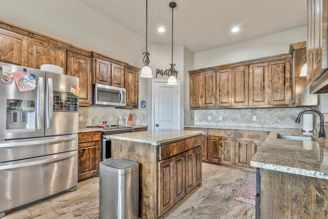 183 Melbourne Dr, Willow Park, TX 76087 - kitchen with stainless steel appliances, a sink, backsplash, light stone counters, and pendant lighting