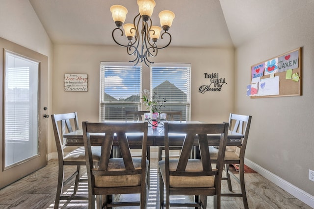 183 Melbourne Dr, Willow Park, TX 76087 - dining area with a chandelier, vaulted ceiling, and baseboards