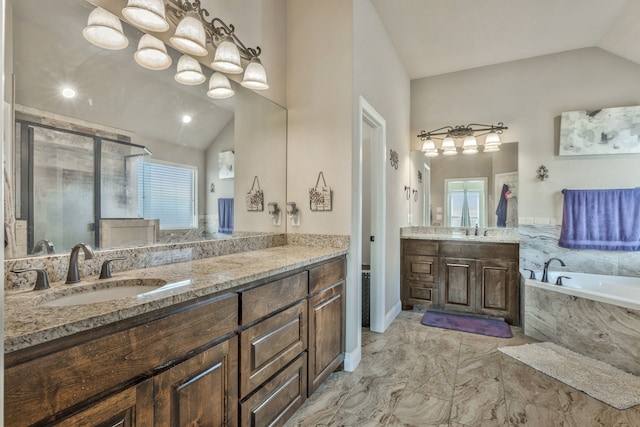 183 Melbourne Dr, Willow Park, TX 76087 - bathroom featuring lofted ceiling, a garden tub, vanity, healthy amount of natural light, and a shower stall