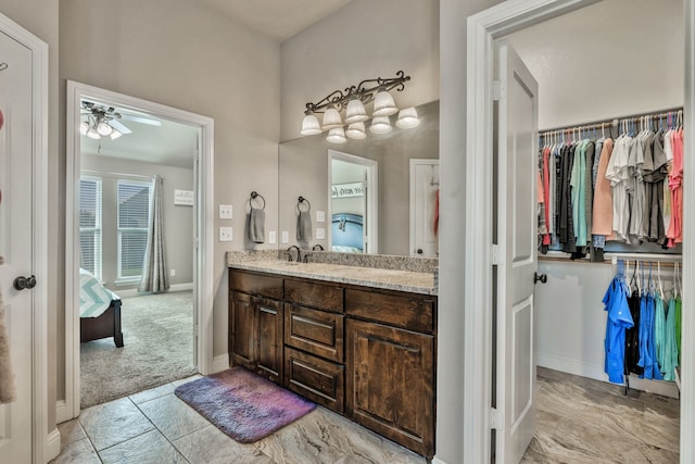 183 Melbourne Dr, Willow Park, TX 76087 - full bathroom with vanity, ensuite bath, a ceiling fan, and a spacious closet