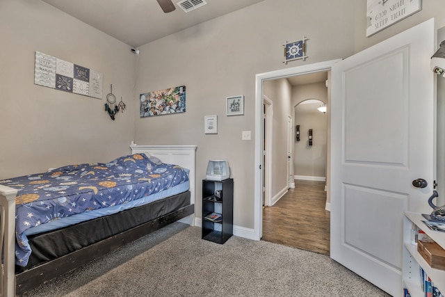 183 Melbourne Dr, Willow Park, TX 76087 - bedroom featuring arched walkways, baseboards, carpet flooring, and ceiling fan