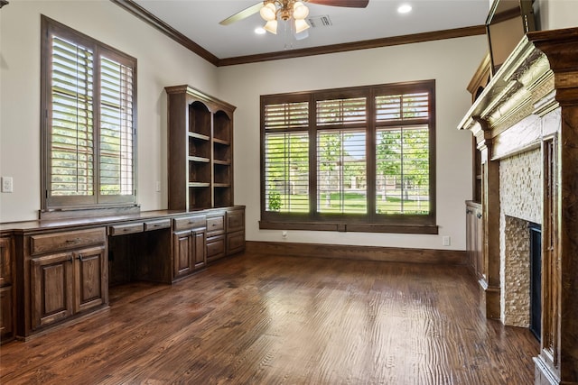 784 Cimarron Ct, Argyle, TX 76226 - unfurnished office featuring ceiling fan, ornamental molding, dark wood finished floors, a fireplace, and built in desk