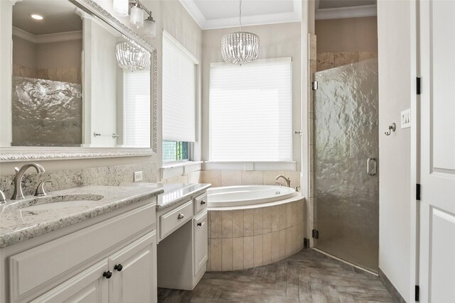 784 Cimarron Ct, Argyle, TX 76226 - full bathroom with vanity, a chandelier, crown molding, a garden tub, and a shower stall