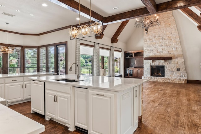 784 Cimarron Ct, Argyle, TX 76226 - kitchen featuring a chandelier, a sink, white cabinets, dark wood finished floors, and recessed lighting