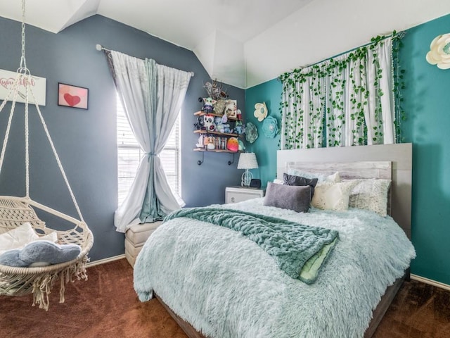 2852 Ector Dr, Grand Prairie, TX 75052 - carpeted bedroom featuring vaulted ceiling and baseboards