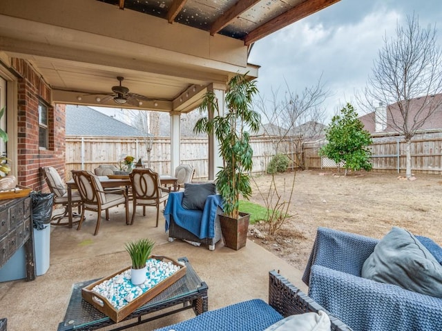 2852 Ector Dr, Grand Prairie, TX 75052 - fenced backyard featuring outdoor dining area, a ceiling fan, outdoor lounge area, and a patio area