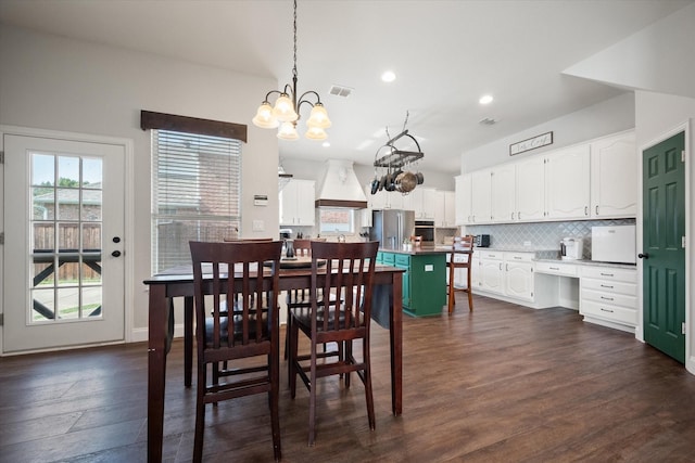 1817 Meadow Ridge Dr, Flower Mound, TX 75028 - dining room with a chandelier, dark wood-type flooring, and recessed lighting