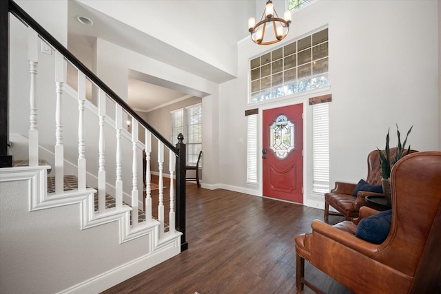 1817 Meadow Ridge Dr, Flower Mound, TX 75028 - foyer entrance featuring stairs, a chandelier, wood finished floors, baseboards, and a high ceiling