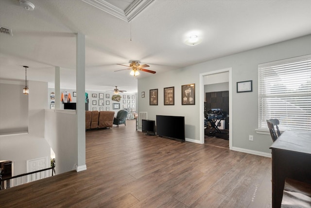 1817 Meadow Ridge Dr, Flower Mound, TX 75028 - living area with a ceiling fan, wood finished floors, baseboards, attic access, and ornamental molding