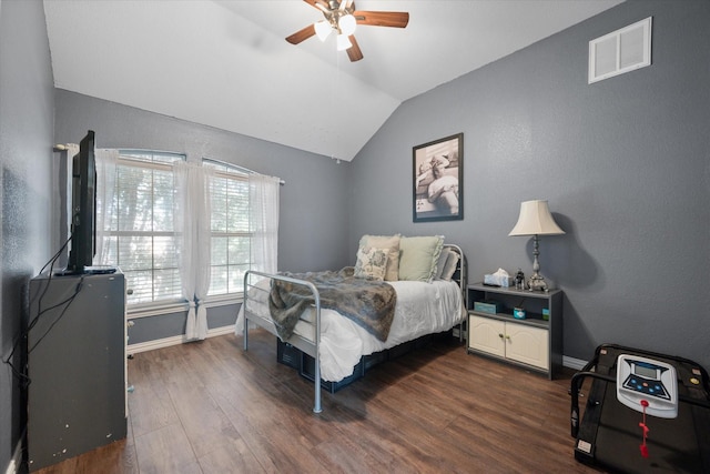 1817 Meadow Ridge Dr, Flower Mound, TX 75028 - bedroom with lofted ceiling, dark wood-type flooring, baseboards, a textured wall, and ceiling fan