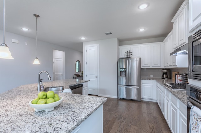 2536 Governors Blvd, Heath, TX 75126 - kitchen featuring stainless steel appliances, a sink, white cabinetry, dark wood-type flooring, and recessed lighting