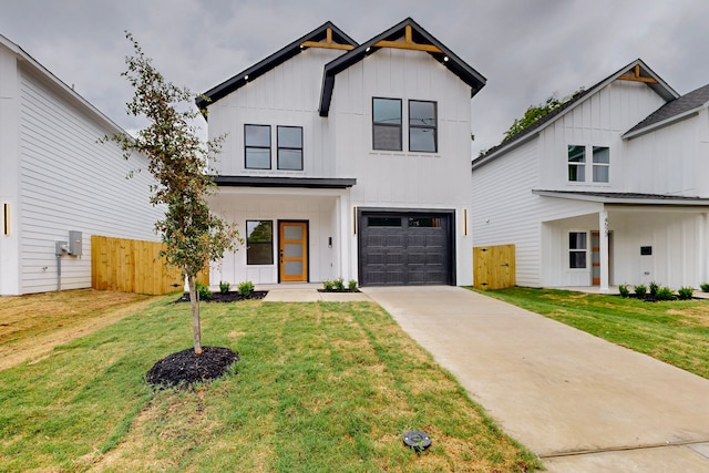 4519 Wahoo St, Dallas, TX 75210 - modern inspired farmhouse featuring board and batten siding, an attached garage, and driveway