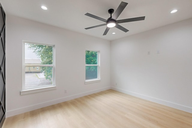 4519 Wahoo St, Dallas, TX 75210 - spare room featuring light wood-type flooring, recessed lighting, baseboards, and ceiling fan