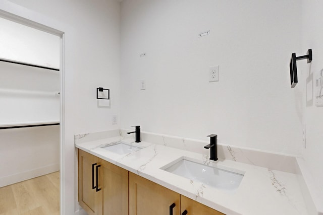 4519 Wahoo St, Dallas, TX 75210 - full bath with wood finished floors and double vanity
