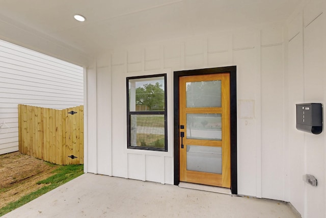 4519 Wahoo St, Dallas, TX 75210 - entrance to property featuring board and batten siding and a patio area