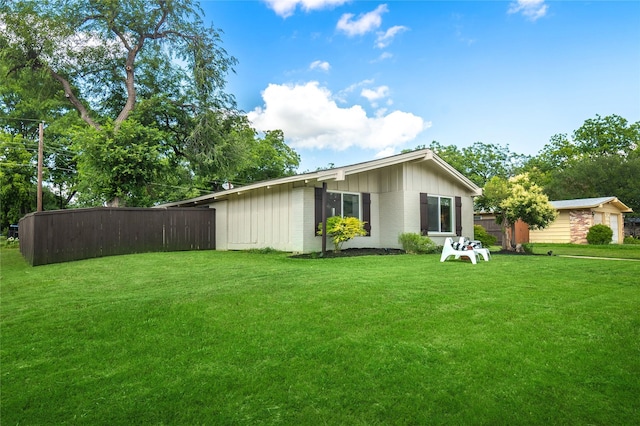 746 Greenhaven Dr, Richardson, TX 75080 - back of property featuring board and batten siding and brick siding