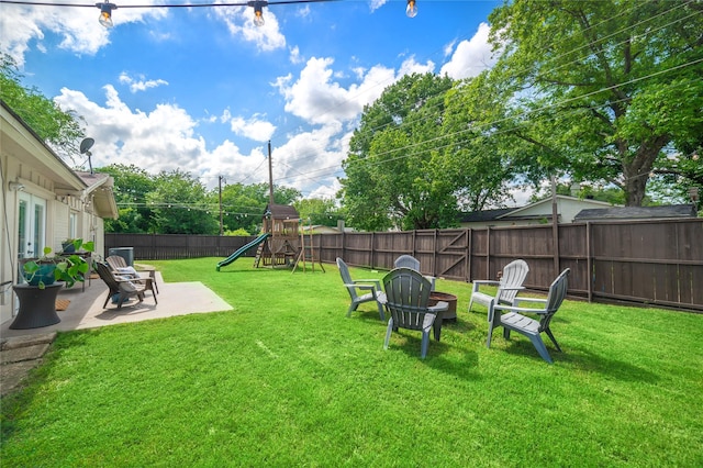 746 Greenhaven Dr, Richardson, TX 75080 - view of yard featuring a playground and a patio