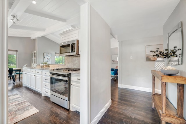 746 Greenhaven Dr, Richardson, TX 75080 - kitchen with appliances with stainless steel finishes, decorative backsplash, white cabinets, dark wood-type flooring, and baseboards