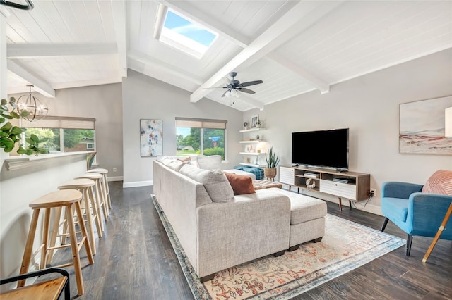 746 Greenhaven Dr, Richardson, TX 75080 - living room with baseboards, a chandelier, dark wood-style floors, a ceiling fan, and a skylight