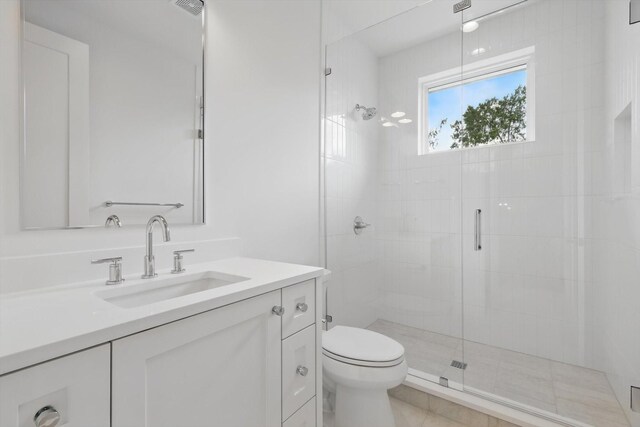 6607 Kenwell St, Dallas, TX 75209 - full bathroom featuring a shower stall, toilet, and vanity