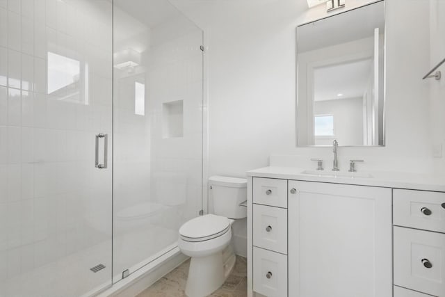 6607 Kenwell St, Dallas, TX 75209 - bathroom featuring toilet, a shower stall, vanity, and marble finish floors