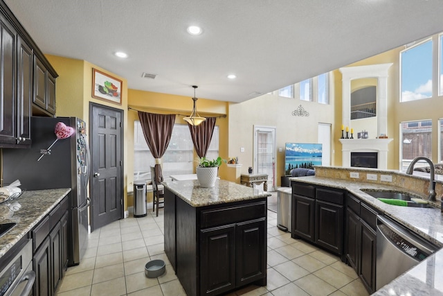 5400 Ivyridge Ln, Mckinney, TX 75071 - kitchen with a sink, appliances with stainless steel finishes, plenty of natural light, and recessed lighting