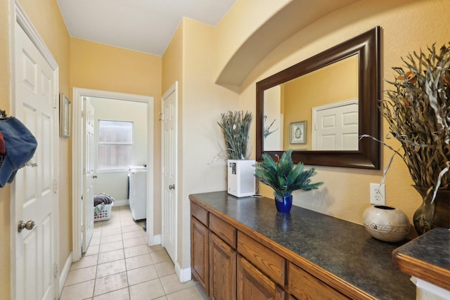 5400 Ivyridge Ln, Mckinney, TX 75071 - corridor with light tile patterned floors and baseboards