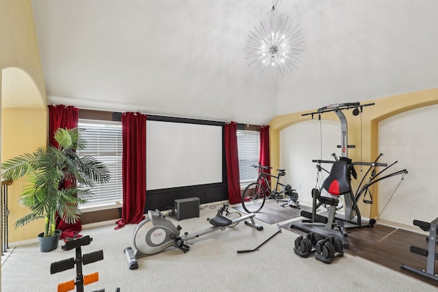 5400 Ivyridge Ln, Mckinney, TX 75071 - workout room featuring baseboards, a chandelier, arched walkways, and carpet flooring