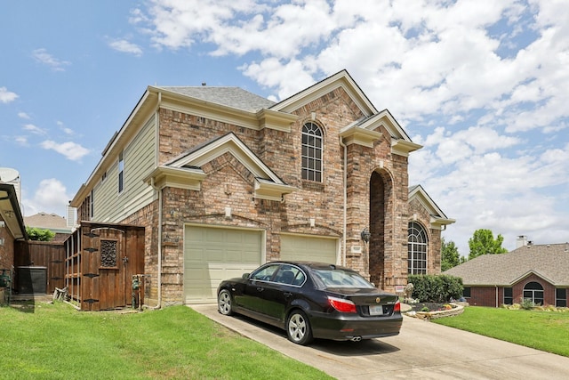 5400 Ivyridge Ln, Mckinney, TX 75071 - traditional home featuring driveway, a garage, brick siding, and central AC unit