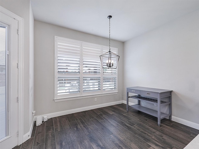 2815 Spring Creek Trl, Celina, TX 75078 - dining room featuring dark wood-type flooring, a chandelier, and baseboards